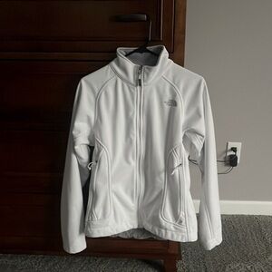 The North Face white jacket women’s size medium.